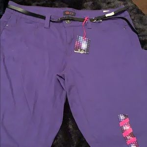 Purple skinny jeans with black belt attached
